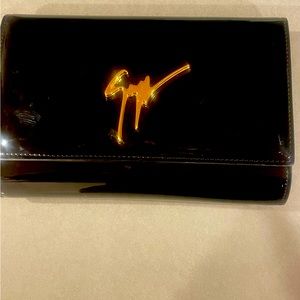 Black and Gold patent leather Giuseppe clutch